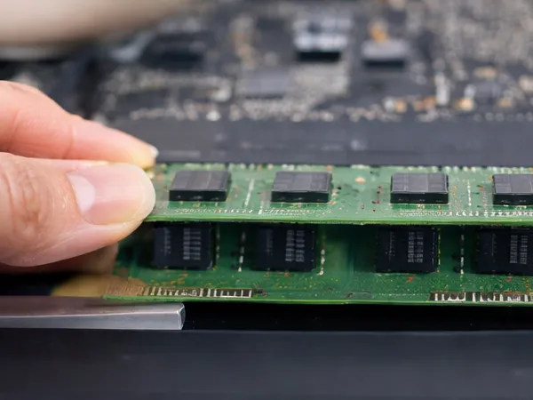 Close-up of RAM being installed into a computer